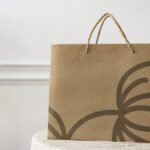 Paper shopping bag in a bright apartment